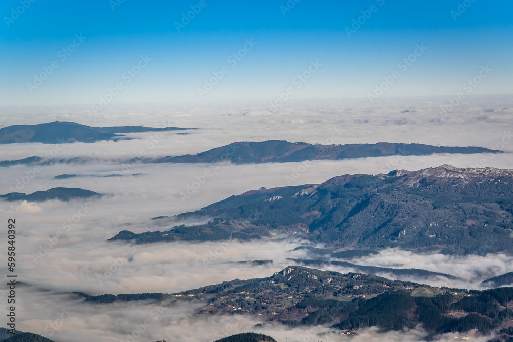 clouds cover the mountains