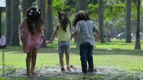 Video Clip Of Three Indian Children Playing In Mud Splash In Garden