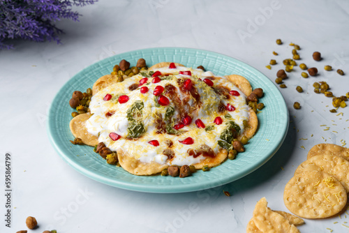 Papri chat or papri chaat is a popular traditional fast food and street food from the Indian subcontinent, in India, Bangladesh, Nepal and parts of Pakistan photo