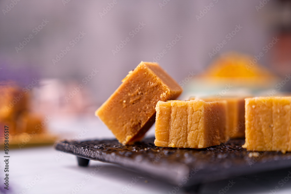 Mysore pak is an Indian sweet prepared in ghee. It originated in the city of Mysore
