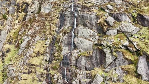 Waterford Mahon Valley Comeragh Mountains waterfall on a cliff after heavy rain bright spring morning photo