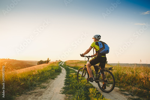 Mountain Bike cyclist on a sunny day. Healthy Lifestyle and Travel Concept