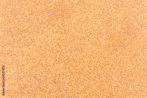 Metal rust texture. Grunge peeling paint background. Dirty industrial steel sheet pattern. Weathered iron surface. Orange color grain pattern.