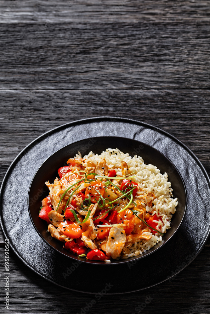 sweet and sour chicken with veggies and rice