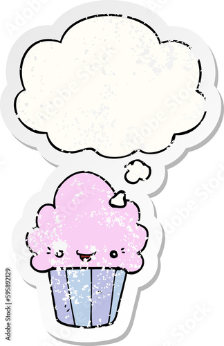 cartoon cupcake with face with thought bubble as a distressed worn sticker