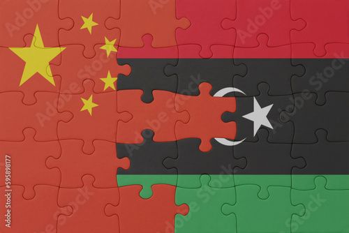 puzzle with the national flag of libya and china . macro.concept.