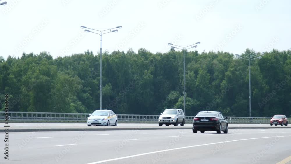 MOSCOW - JUNE 23, 2018: traffic of cars along city streets. highway from Moscow MOSCOW - JUNE 23, 2018: traffic of cars along city streets. highway from Moscow
