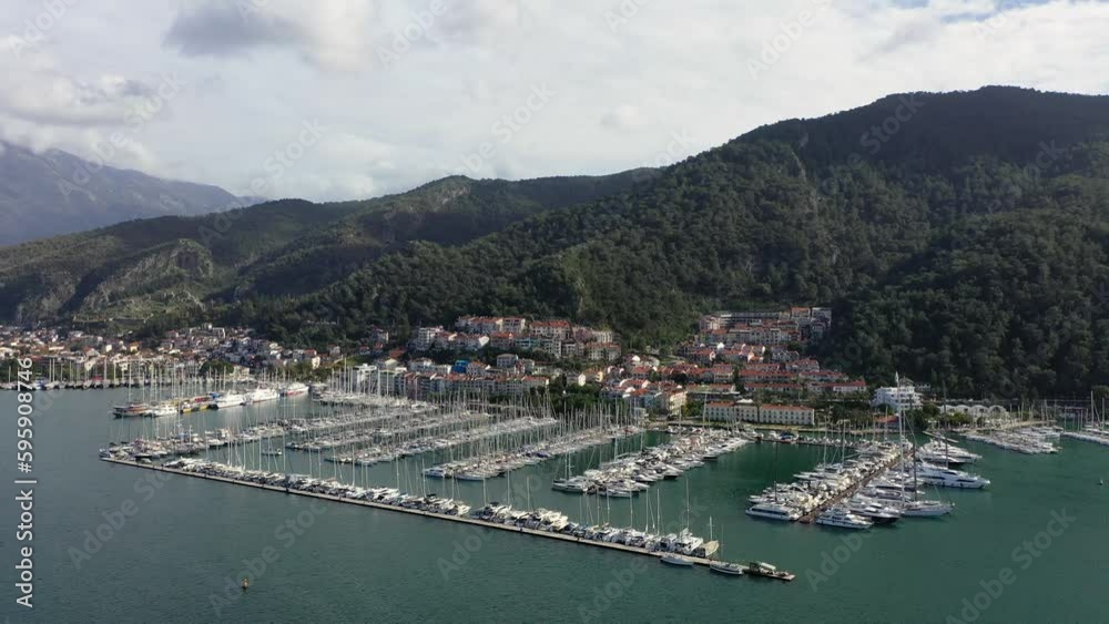 Aerial view of the yacht marina and the city of Fethiye, Mediterranean Sea, Turkey. Aerial view of the yacht marina and the city of Fethiye, Mediterranean Sea, Turkey.
