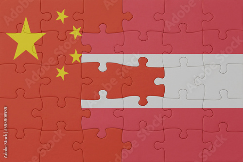 Photography puzzle with the national flag of austria and china