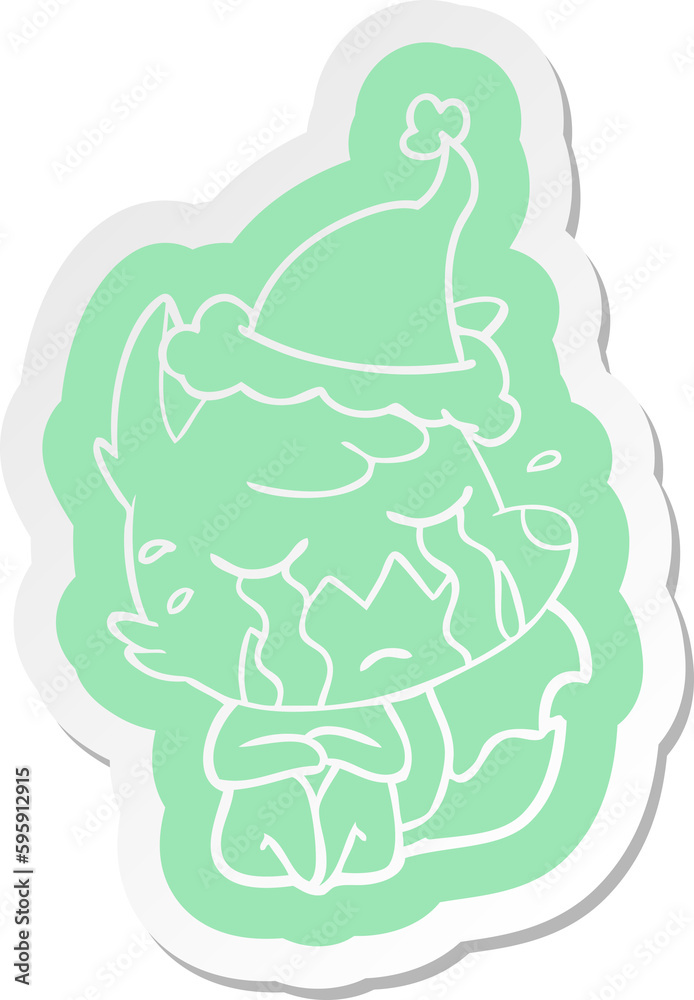 Naklejka premium crying fox quirky cartoon sticker of a wearing santa hat