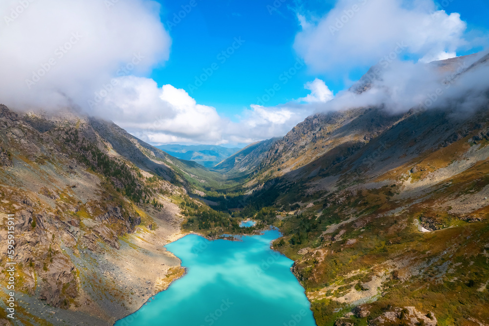 Amazing nature landscape Turquoise picturesque Kuyguk lake, Altai mountains, Siberia Russia. Aerial top view