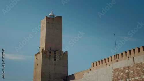 Tower of a fort now Archeological Museum Of Sousse in Tunisia. African fortress turned into museum an attraction for tourists. photo