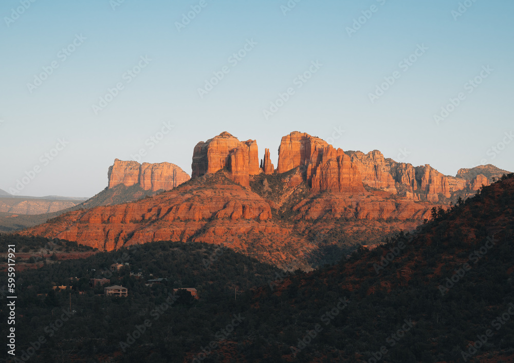 A close up on the sandstone saddle points, or gaps of Cathedral Rock, one of the most famous natural landmarks surrounding the desert town of Sedona, Arizona, in the Coconino National Forest, USA.