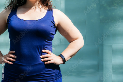 Embracing Body Neutrality. Body neutrality body positivity movement, which emphasizes being neutral towards ones body, neither overly positive nor negative. Outdoor portrait of fitness curvy woman