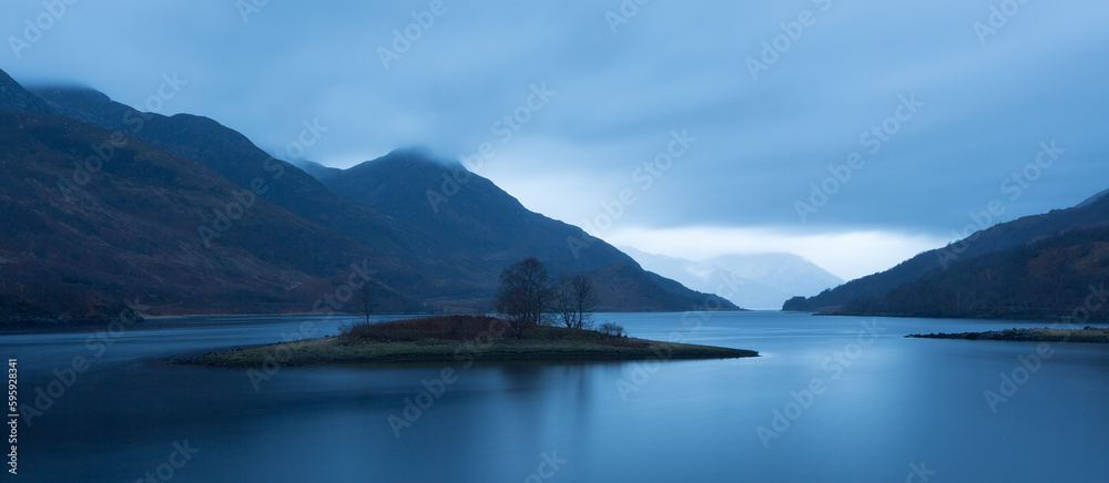 Loch Leven in winter, St. Serf's Inch, Perth and Kinross, Scotland, UK. Long exposure, dark scene, copy space, tourism, background, banner