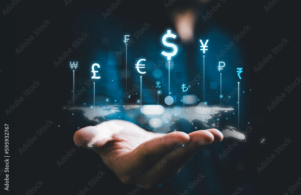 Businessman holding virtual currency sign include dollar euro pound sterling yen yuan won for technology currency exchange and money transfer , Financial and investment concept. - obrazy, fototapety, plakaty 
