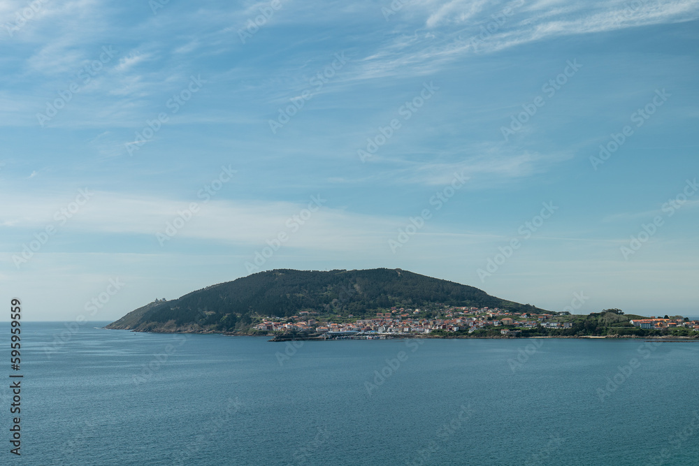 View of the village of Fisterra and the cape of Finisterre