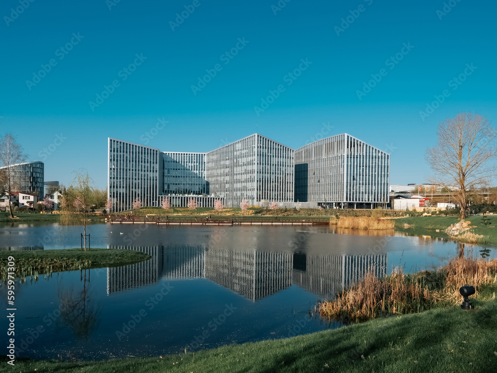 Fototapeta premium Japanese garden in Vilnius in spring. View of the business center Park Town