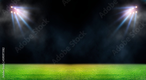Green soccer field, bright spotlights,