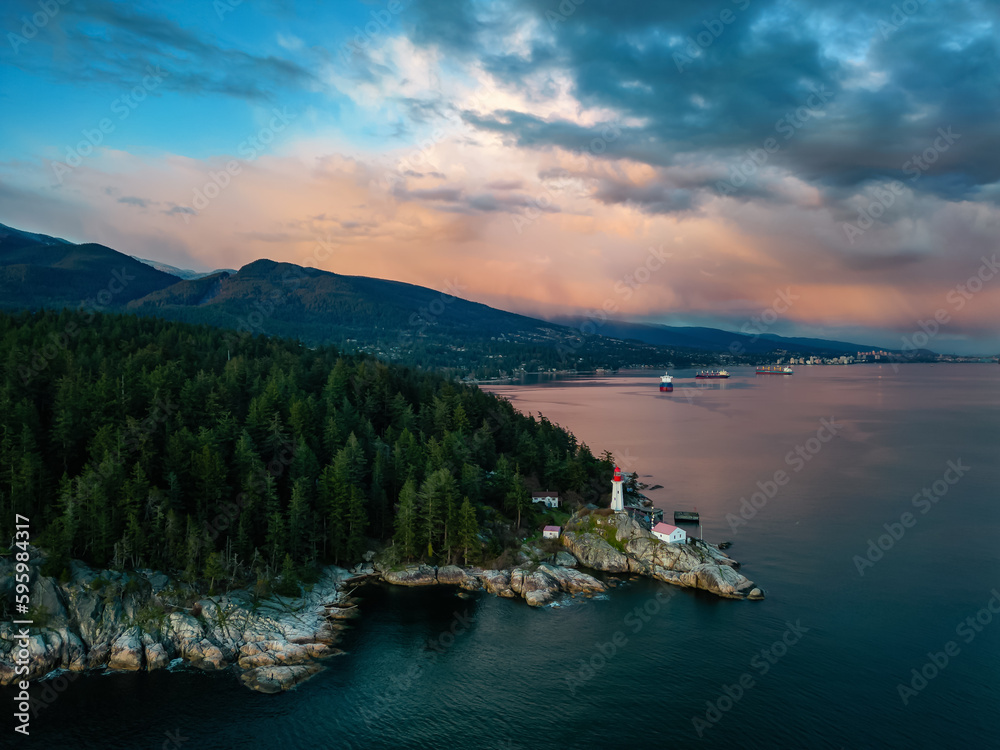 Lighthouse Park in West Vancouver, British Columbia, Canada. Aerial Background. Sunny Cloudy Sunset Sky