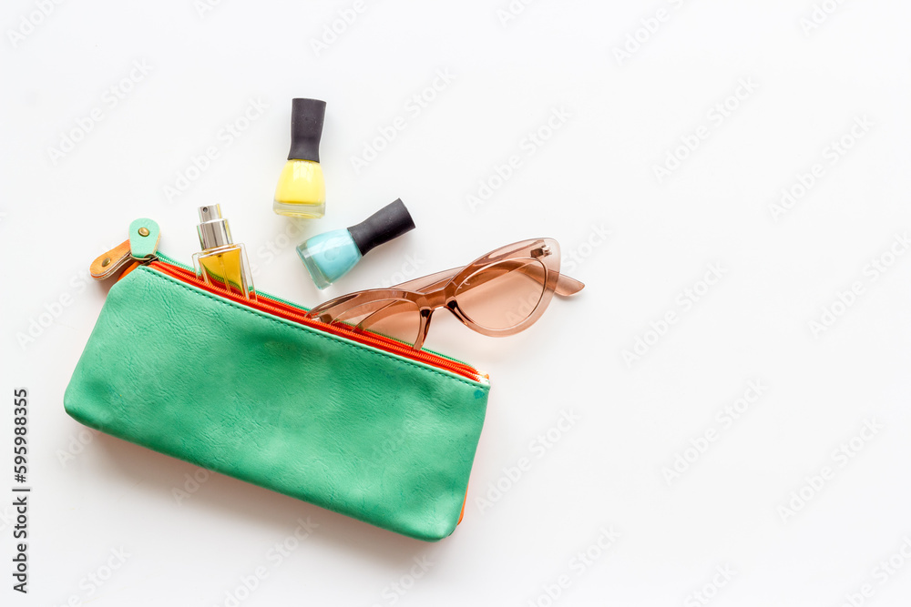 Cosmetic bag with sunglasses for beach holidays and travel Cosmetic bag with sunglasses for beach holidays and travel