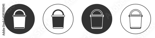 Black Bucket icon isolated on white background. Circle button. Vector