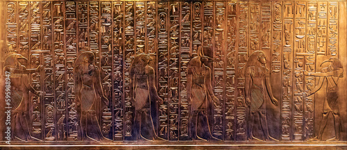 Bas relief with ancient egyptian gods from Tutankhamun tomb photo