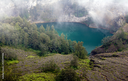 Kelimutu volcano with color changing lakes on Flores Island, Indonesia photo