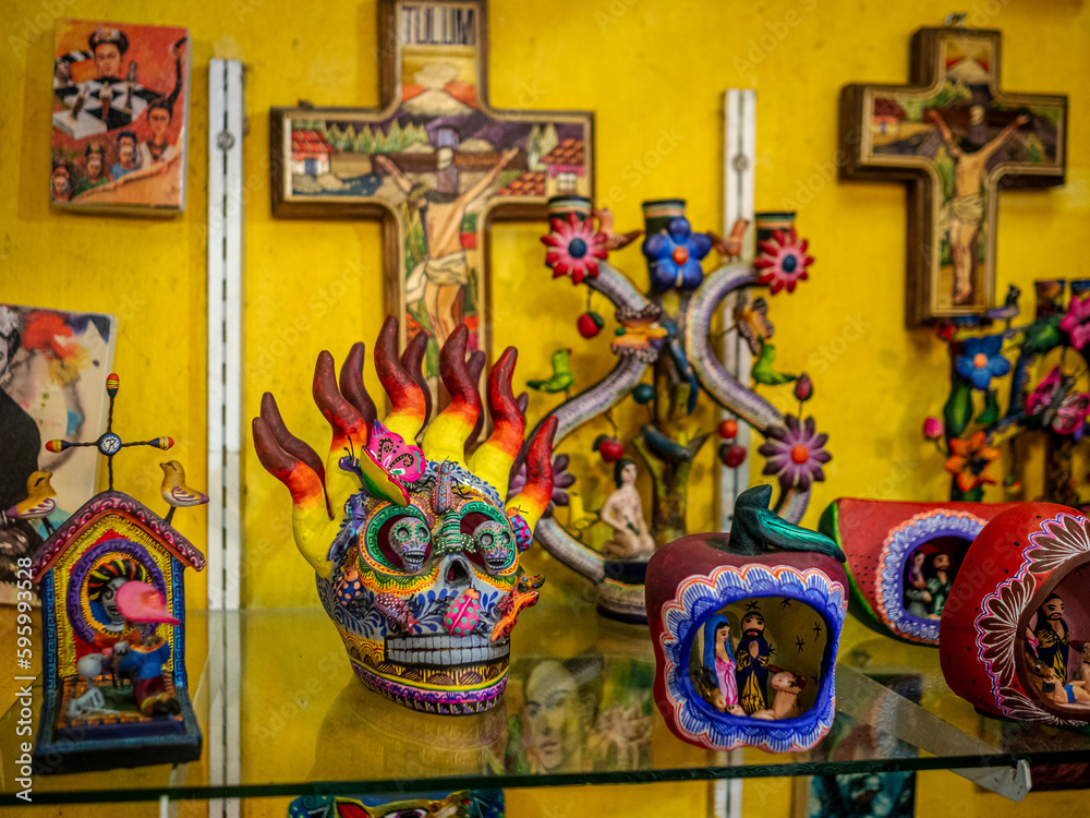 Colorful Mexican folk art, skulls and crosses