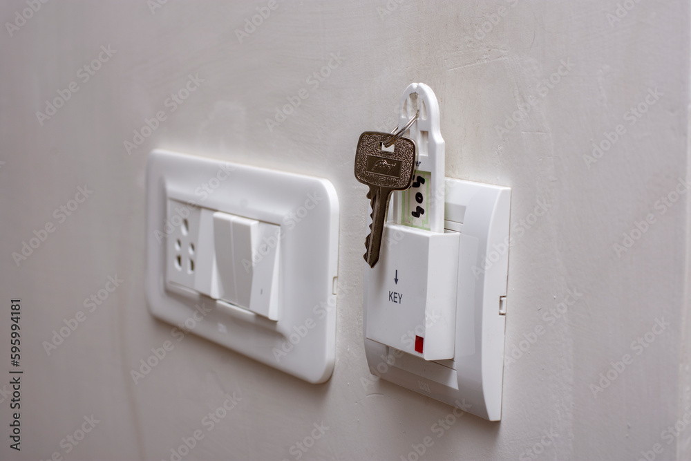 Hotel room electronic key with switch board. Hotel concept.