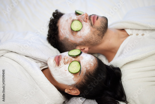 Obraz na plátně Today is our pamper day. a young couple having a spa day at home.