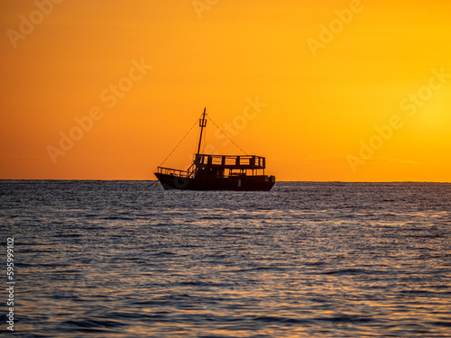 Sunset, sea, ships and boats