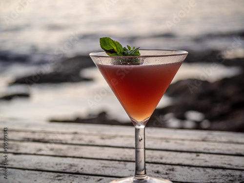 Drink on the beach during sunset photo