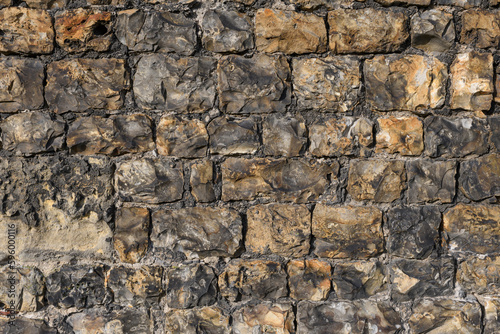 Old stone texture of mid century wall. Marble and stone wall background.