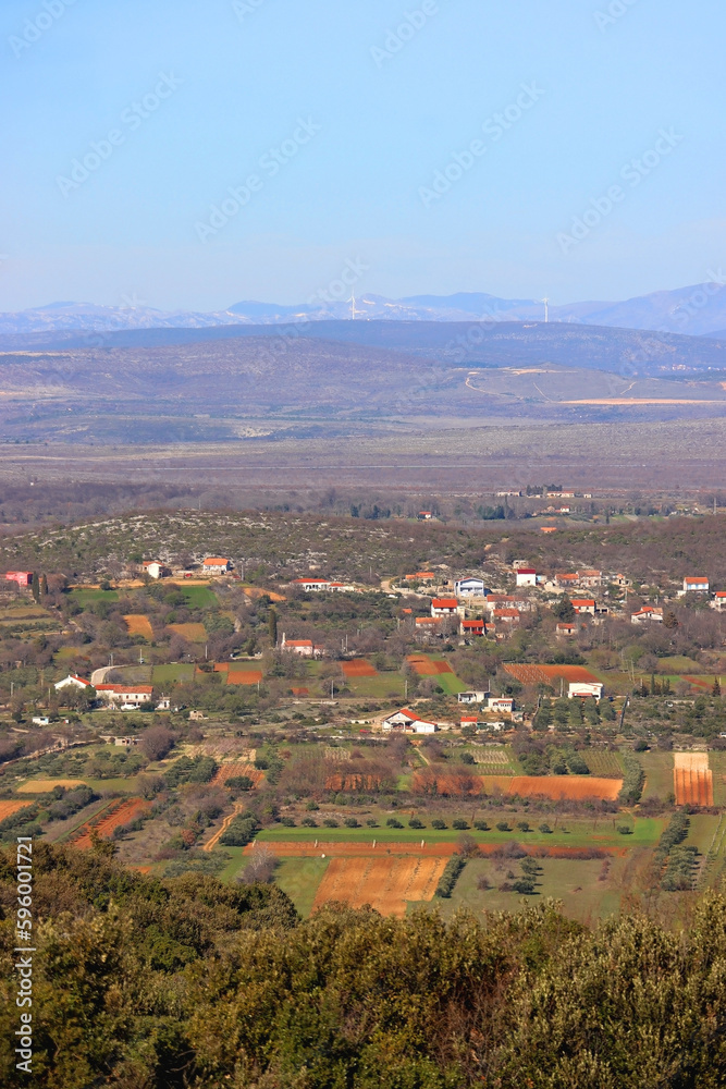Fototapeta premium Agricultural fields in village Vrana, south Croatia. early spring, aerial view.