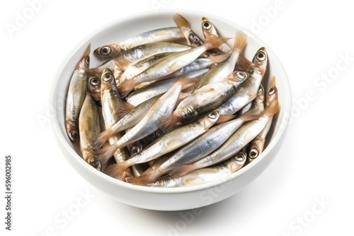 Anchovy in a white bowl. Ingredients for making dishes, recipes, cuisine, plate, food.