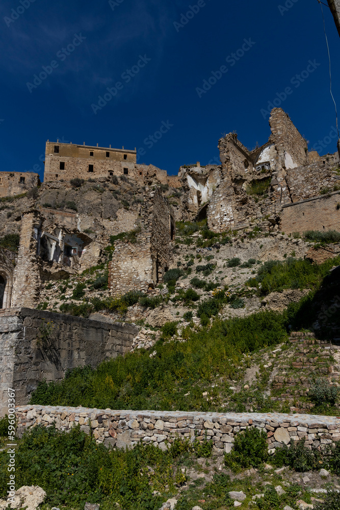 Craco, Basilicata. Abandoned city. A ghost town built on a hill and abandoned due to geological problems. Surreal look, horror film scenery. Panorama of the Calanchi Park.