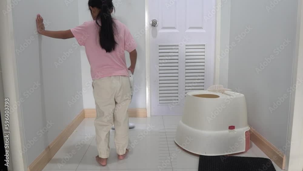 Girl picks up her cat poop to dump in the house, cat poops in the