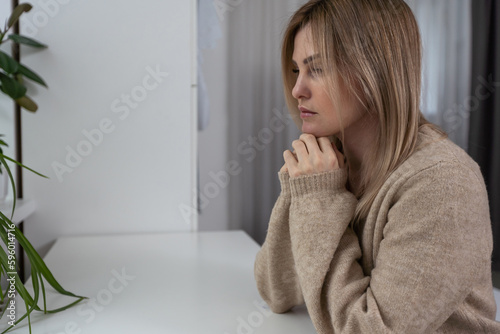 a woman is praying, office, home