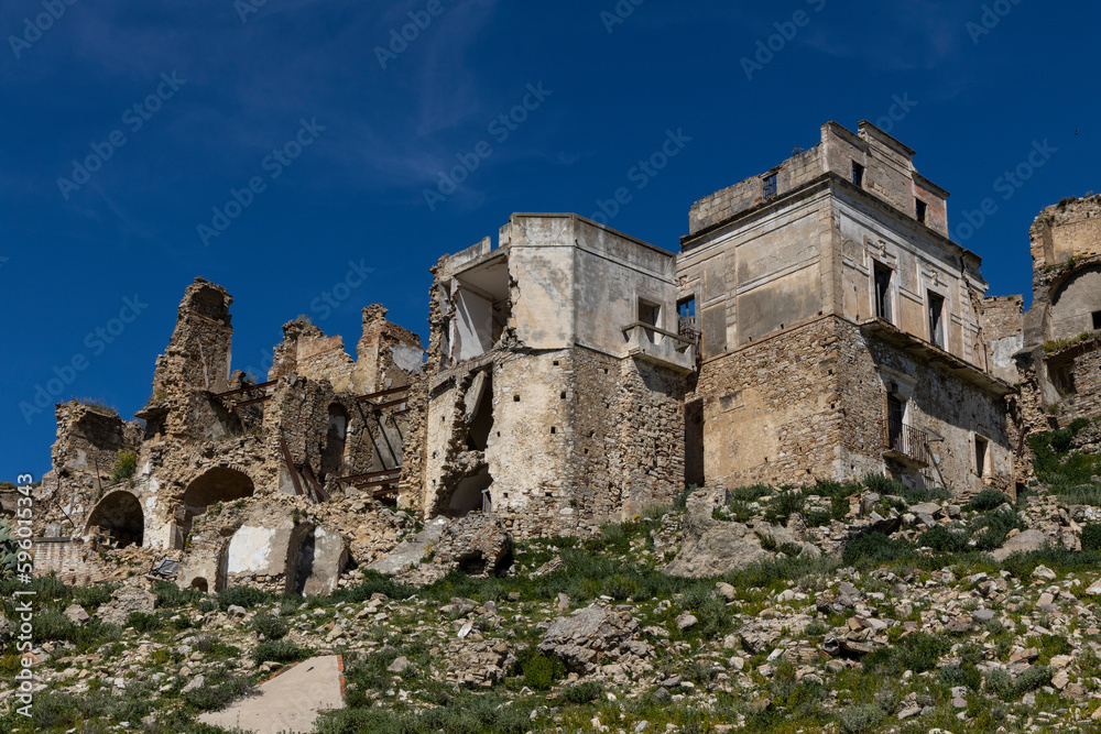 Craco, Basilicata. Abandoned city. A ghost town built on a hill and abandoned due to geological problems. Surreal look, horror film scenery. Panorama of the Calanchi Park.