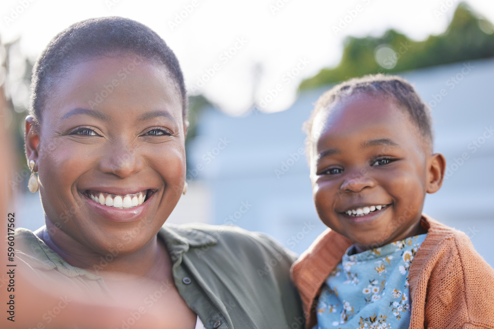 Smile for the selfie. an adorable little girl taking selfies with her mother in a garden. Smile for the selfie. an adorable little girl taking selfies with her mother in a garden.