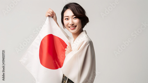 A fictional person. Joyful Japanese woman celebrating National Flag Day