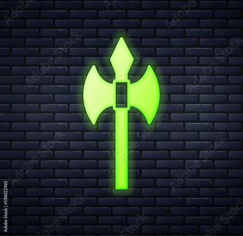 Glowing neon Medieval axe icon isolated on brick wall background. Battle axe, executioner axe. Medieval weapon. Vector