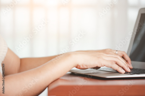 Asian woman's hand using a ...
