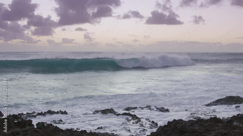 Scenic Hawaii landscape shot on RED camera. Sea waves crashing with splashes, gentle blue dusk evening sky after sunset. Beautiful sea background, slow motion RED camera shot. Rocky beach Oahu island Scenic Hawaii landscape shot on RED camera. Sea waves crashing with splashes, gentle blue dusk evening sky after sunset. Beautiful sea background, slow motion RED camera shot. Rocky beach Oahu island