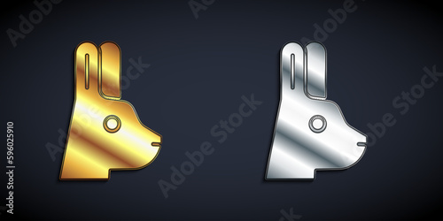 Gold and silver Rabbit with ears icon isolated on black background. Magic trick. Mystery entertainment concept. Long shadow style. Vector