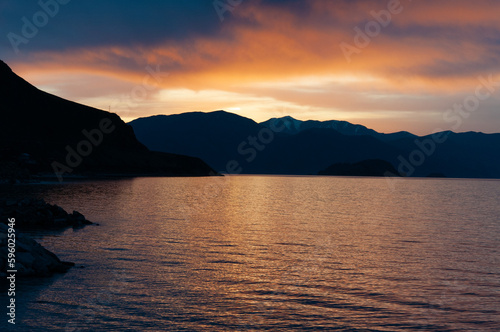 Lovely sunset over the sea  cloud the evening sky and mountain