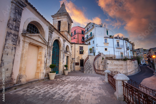 Ragusa, Sicily, Italy. Cityscape image of historical town Ragusa, Sicily with the St. Mary of the Stair church (Santa Maria delle Scale) at sunset. © rudi1976