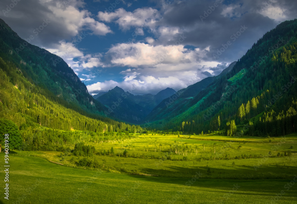 Scenic mountain landscape with beautiful valley and mountain peaks