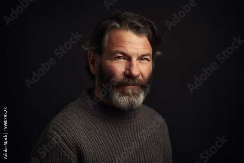 Environmental portrait photography of a pleased man in his 40s wearing a cozy sweater against an abstract background. Generative AI